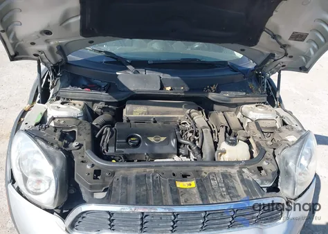 2013 Mini Countryman Cooper S z USA, uszkodzony, nr VIN WMWZC3C57DWP22122